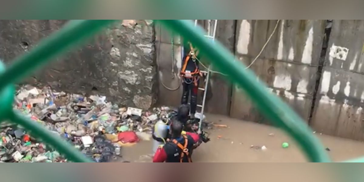 Fire and rescue department officials during rescue efforts. (Screengrab)