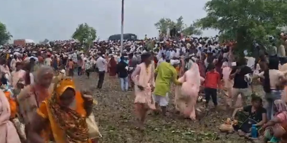 People at the Hathras stampede site. (Screengrab)