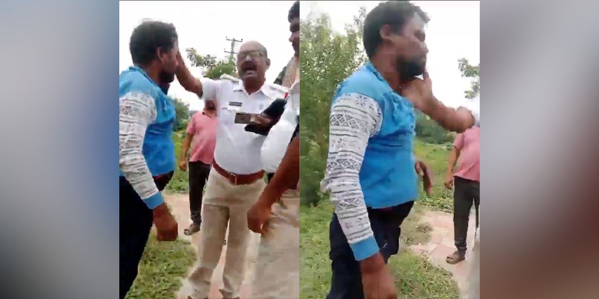 SI Yadgiri assaulting the driver.