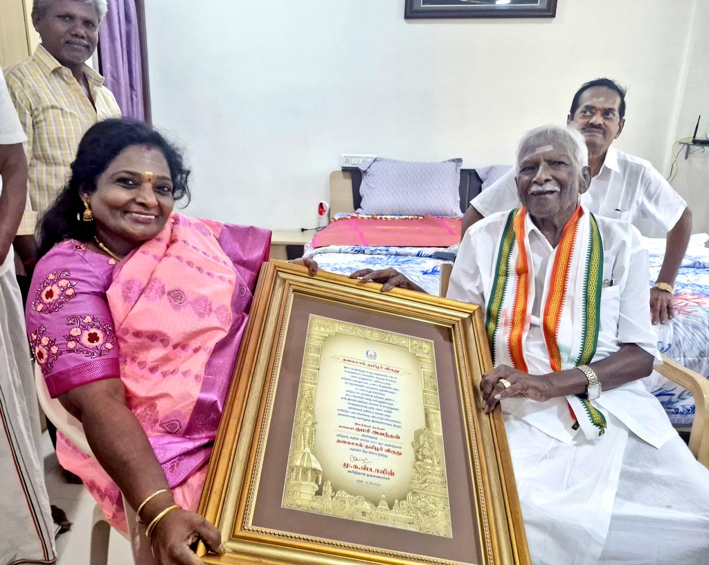 Tamilisai Soundararajan and Kumari Ananthan with the award citation. (Dr Tamilisai Soundararajan/X)