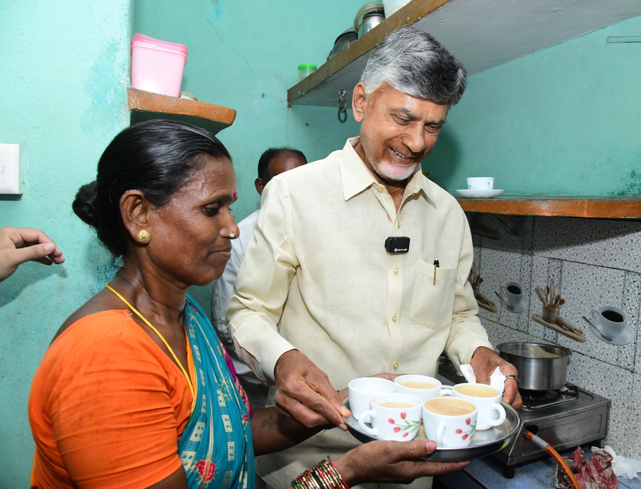 Chief Minister N Chandrababu Naidu preparing tea at Santhamma's house on Friday, 1 November. (X)