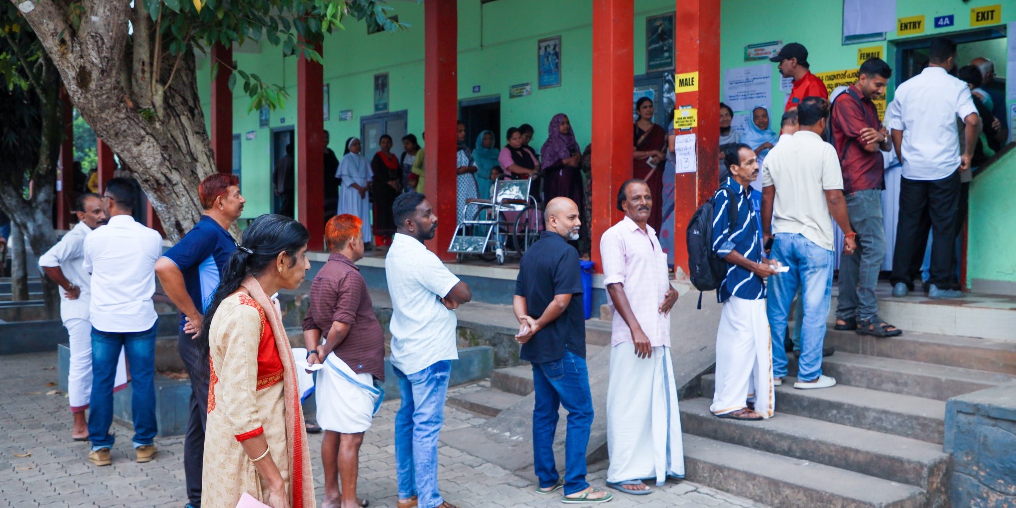Voters in a polling booth in Wayanad.