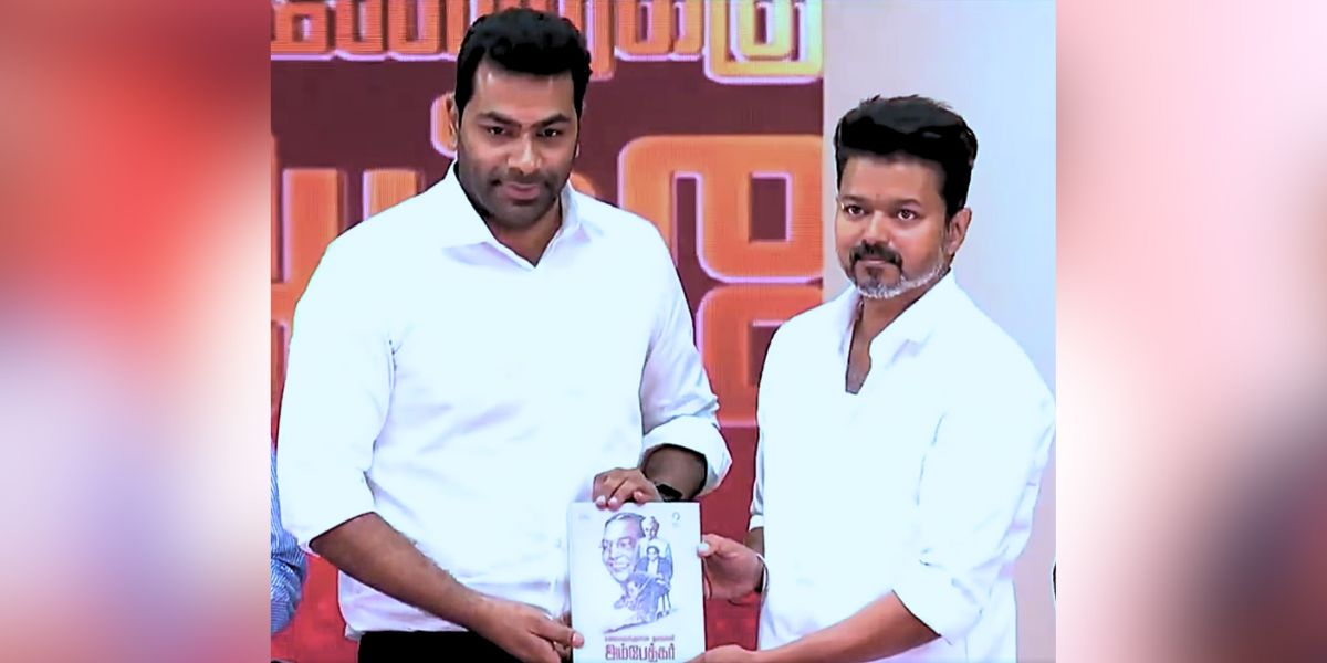Aadhav Arjuna and Vijay during the book launch.