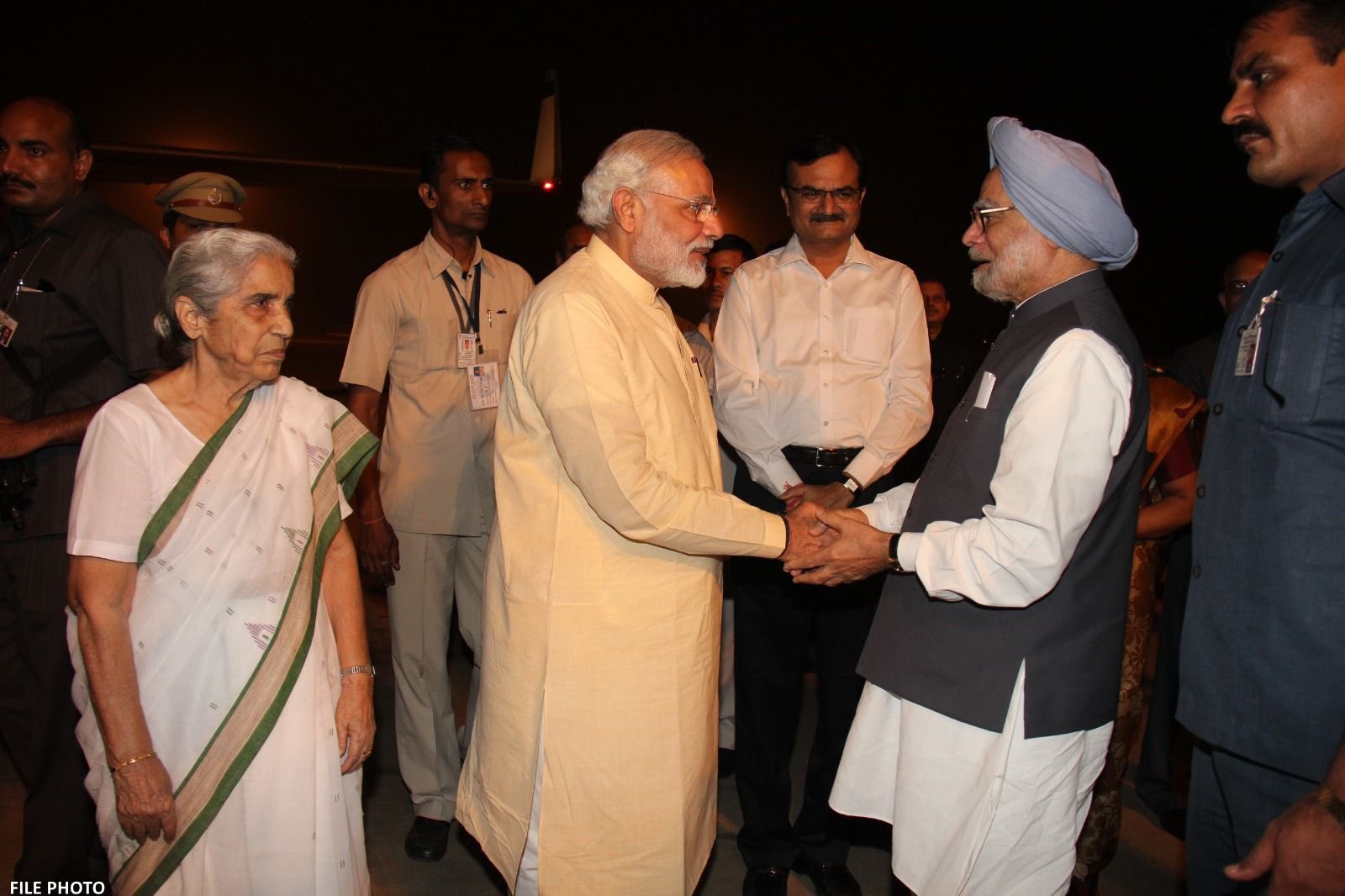 A file photo of Prime Minister Narendra Modi with Manmohan Singh.