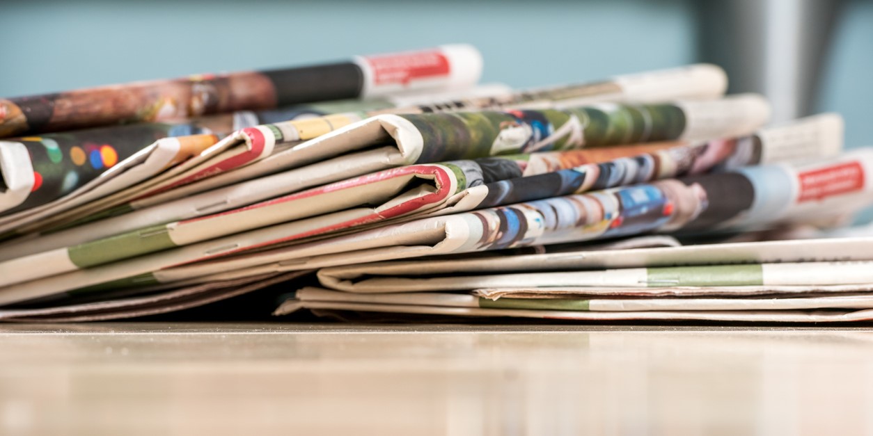 A stack of newspapers. (iStock)
