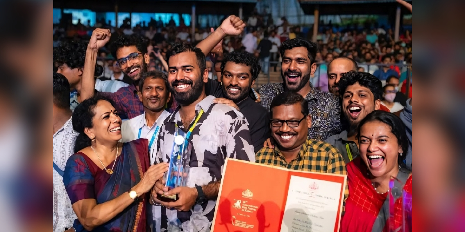 Fazil Razak and crew after reviewing awards at IFFK