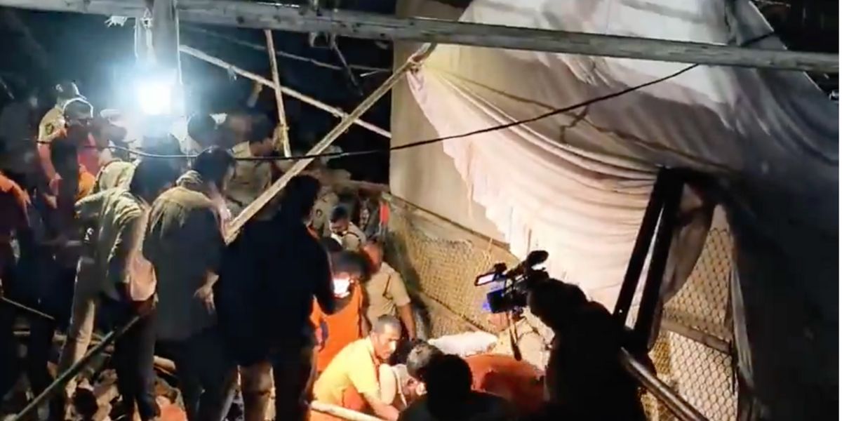 Rescue efforts underway at the wall collapse site in Simhachalam Temple.