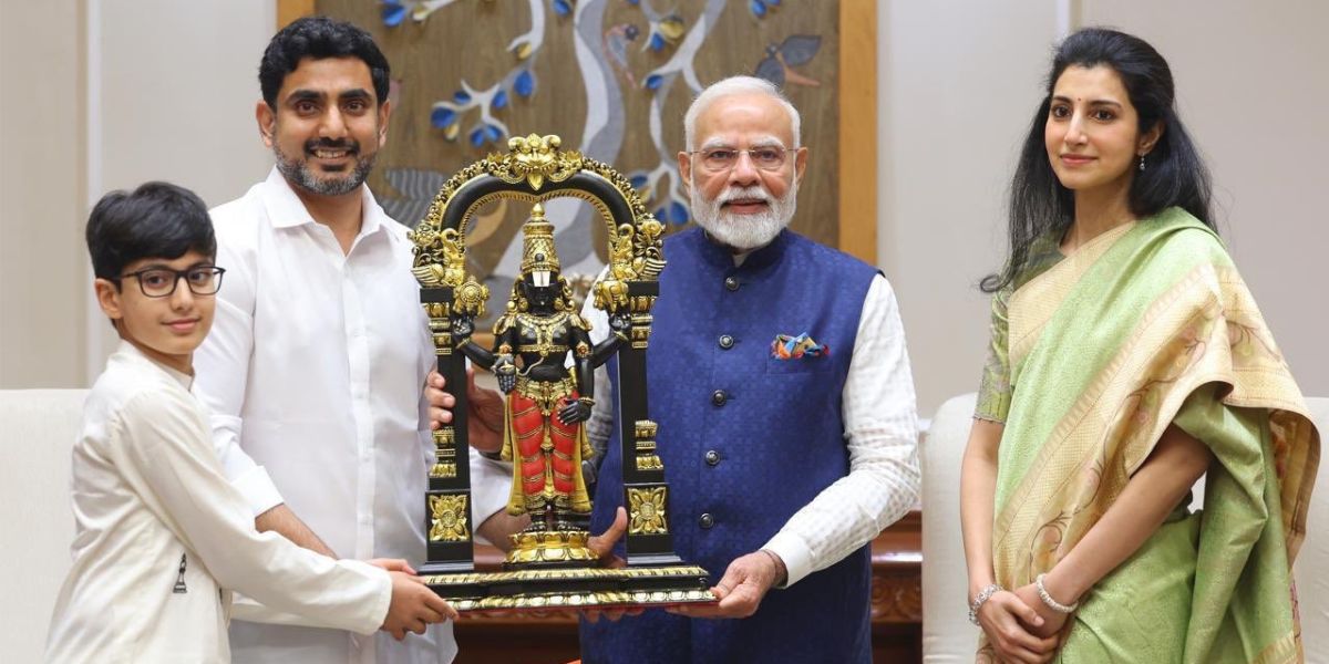 Andhra Pradesh Minister Nara Lokesh, his wife Brahmani, and their son Devansh with Narendra Modi.