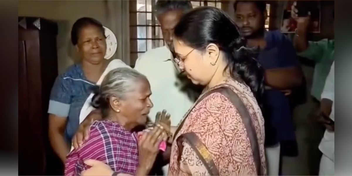 Health Minister Veena George with the family of Bindu.