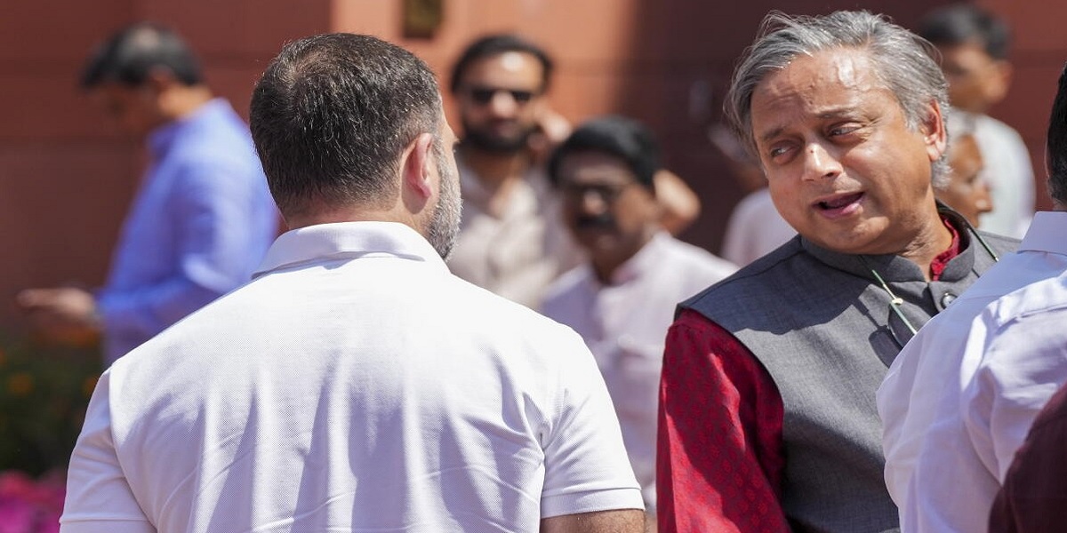 Shashi Tharoor facing Rahul Gandhi.