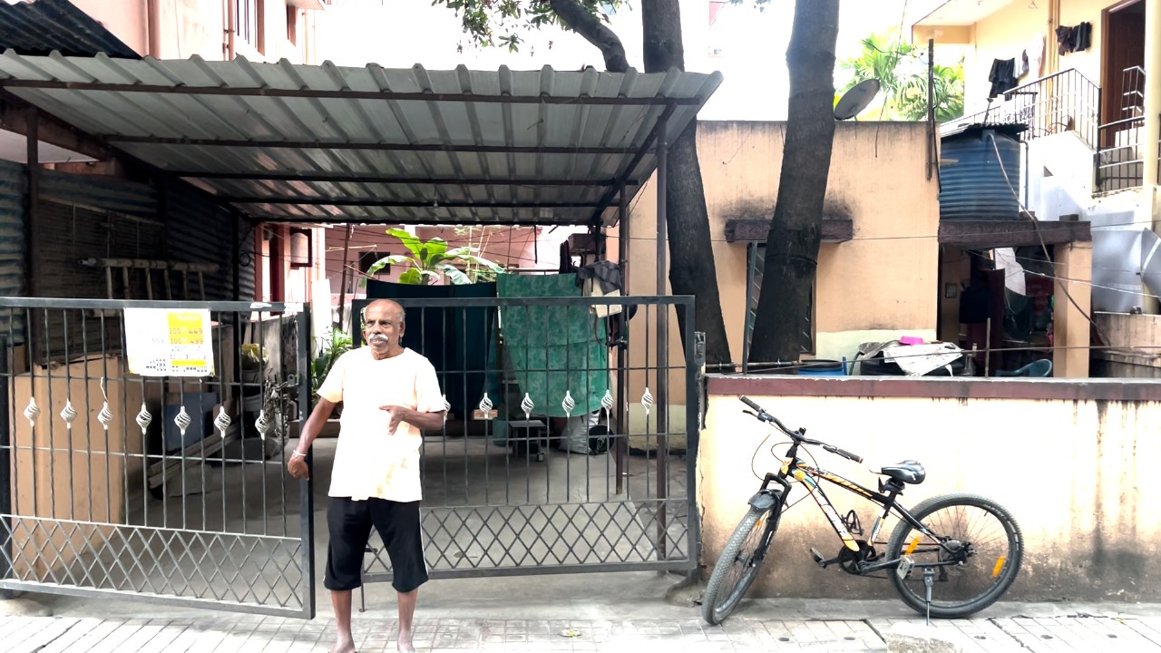 TS Gopinath in front of his house at Chowdeshwari Layout in Marathahalli.
