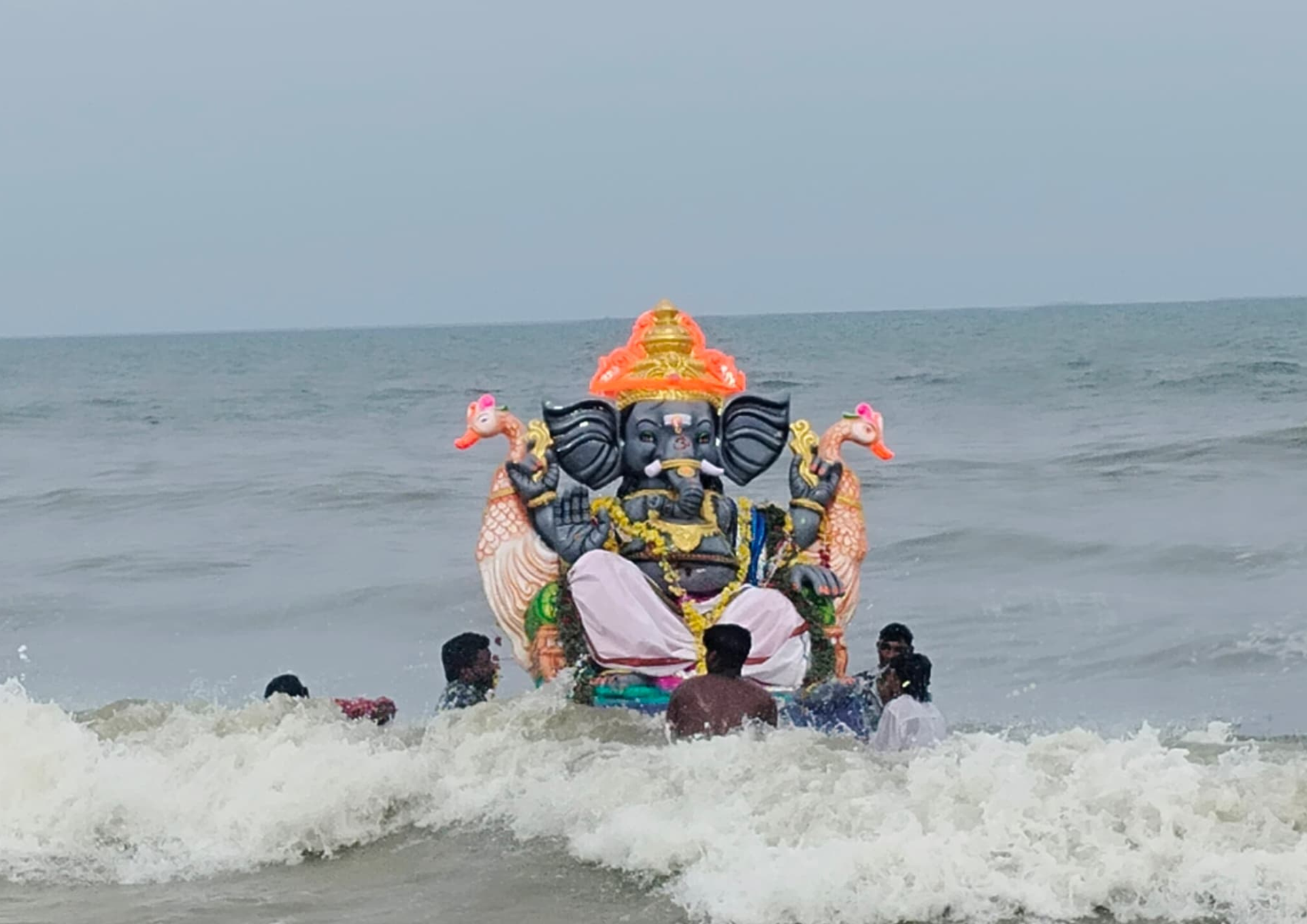 Vinayagar idol immersion at Pattinapakkam beach in Chennai.
