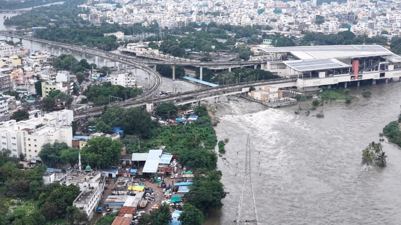 An overflowing Musi River flooding the area near the MGBS in Hyderabad.
