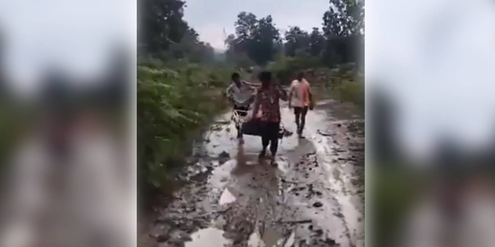 Tribal woman forced to deliver baby on muddy road