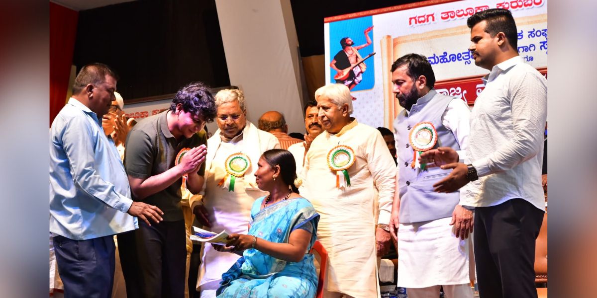 Siddaramaiah's grandson Dhawan Rakesh during a public meeting.