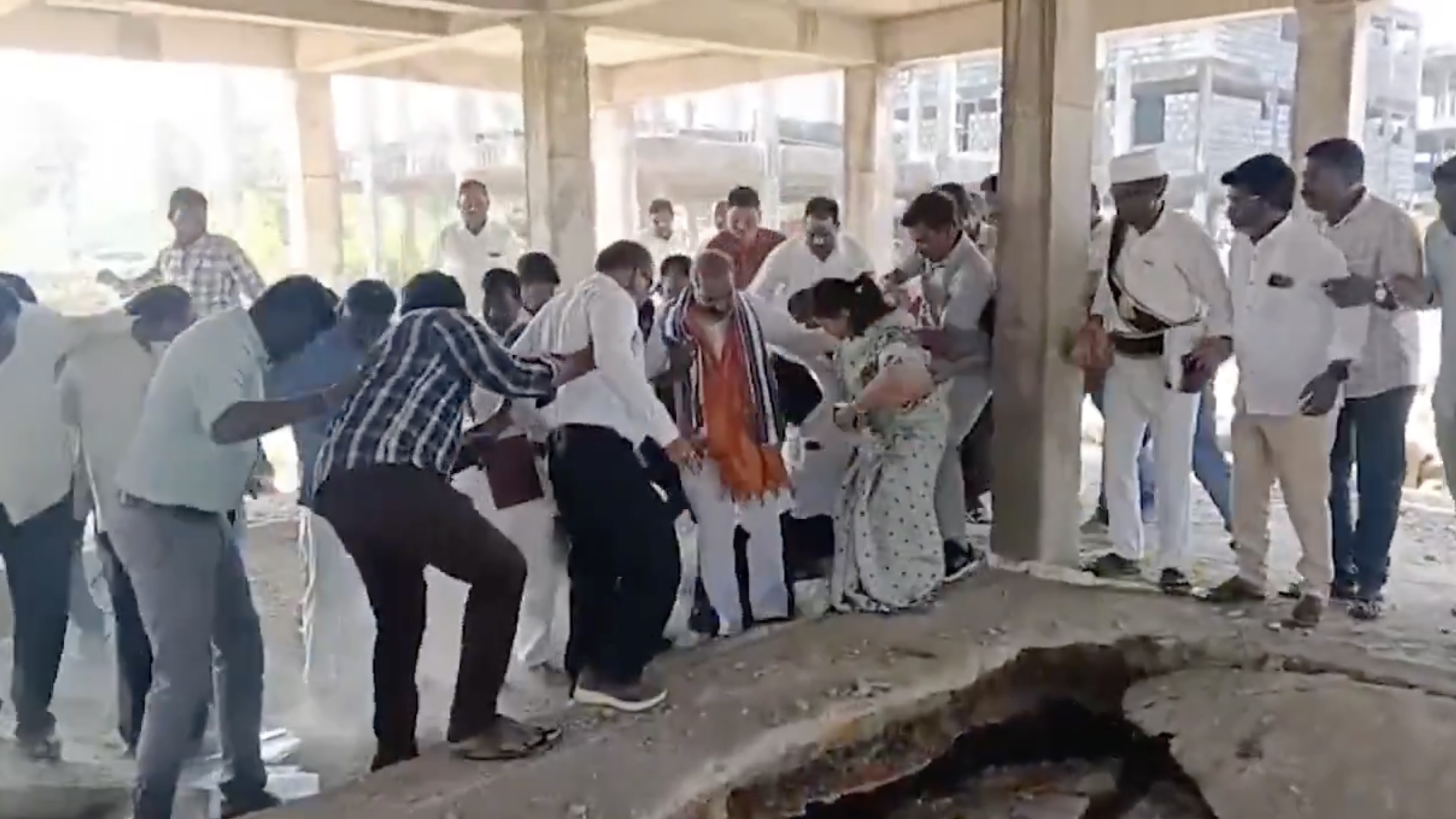 Alert police personnel and the MLA’s personal staff acted swiftly, pulling the legislator and officials to safety. No one sustained injuries.