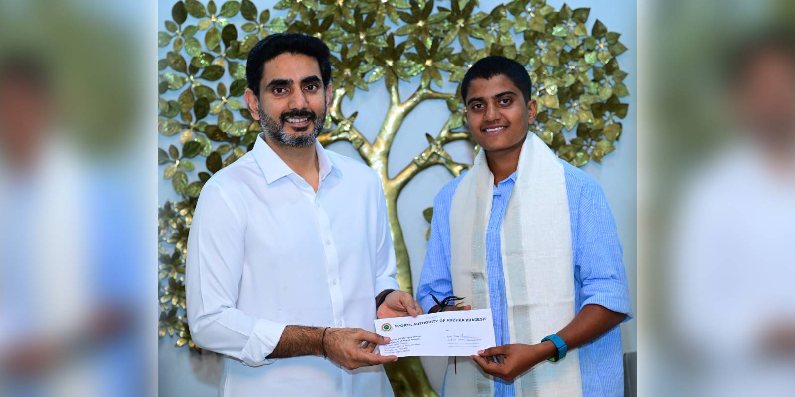 Nara Lokesh meets cricketer Shree Charani