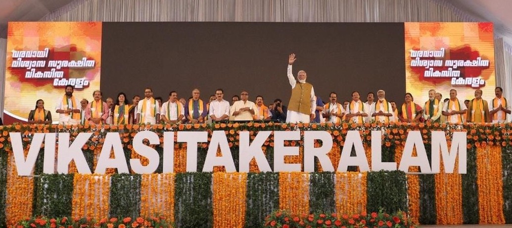 Prime Minister Narendra Modi greets the audience at a BJP rally in Thiruvananthapuram on Friday, 23 January.