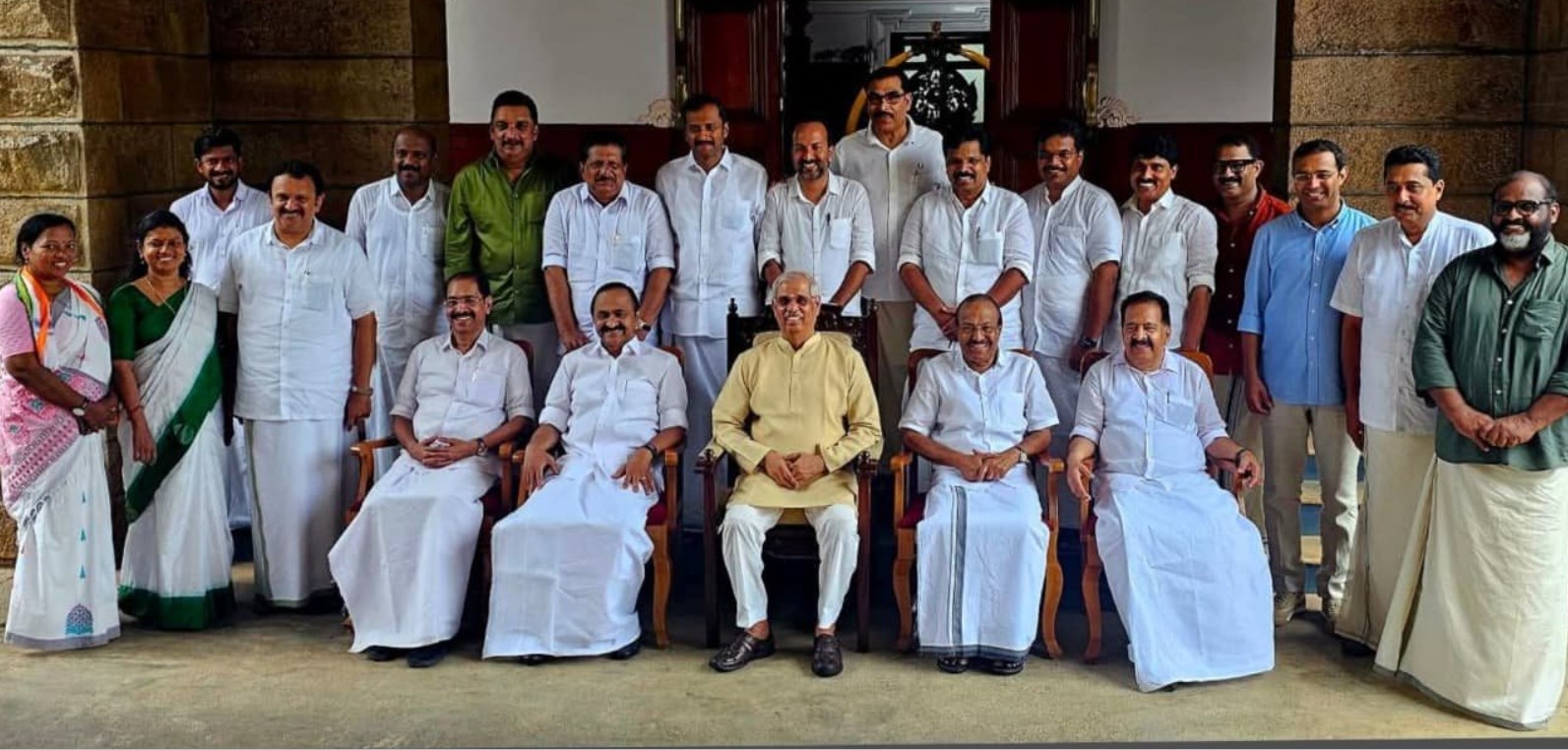 Newly sworn-in Kerala Cabinet with Governor Rajendra Arlekar. Credit: x.com/INCKerala