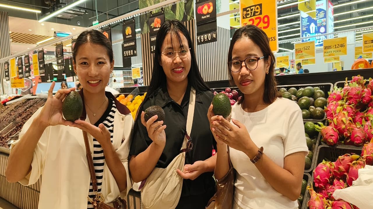 Manipur students with their favourite Indian avocados at Lulu Mall, Kottayam