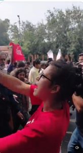 AISA's Neha Bora leading the march to Dilli Haat before she was detained and taken away.
