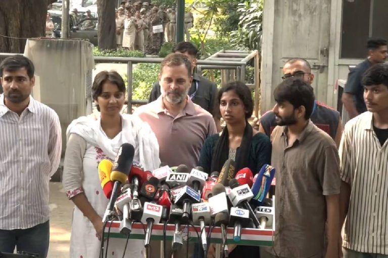 Rahul Gandhi addressing the press with youngsters.