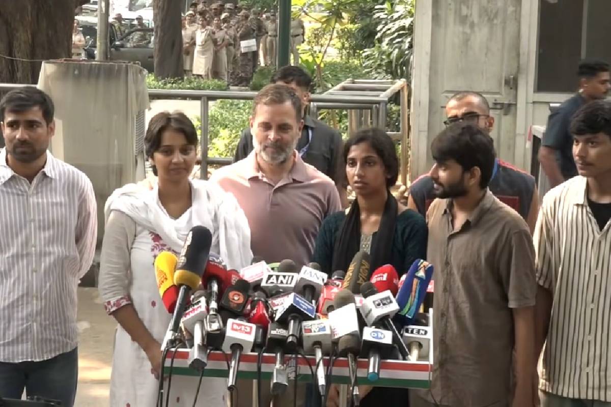 Rahul Gandhi addressing the press with youngsters.