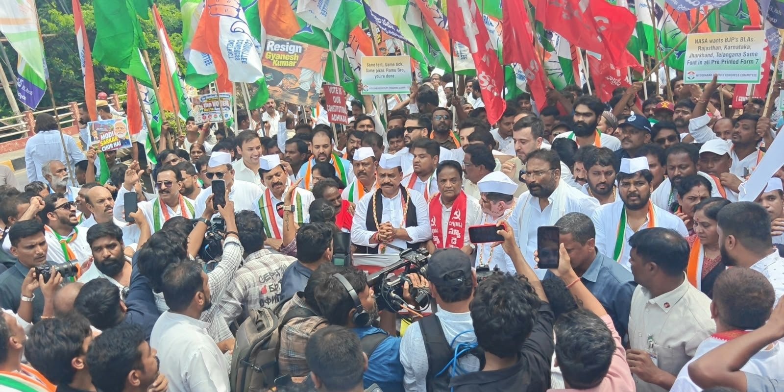 The rally began at the Indira Gandhi statue on Necklace Road and headed to Lok Bhavan.