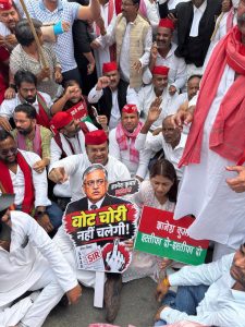 Samajwadi Party workers demand the resignation of CEC Gyanesh Kumar in Lucknow.