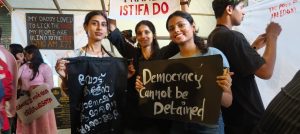 Students from various institutions held posters opposing Gyanesh Kumar